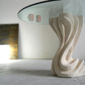 tavolo cristallo rotondo e base in pietra